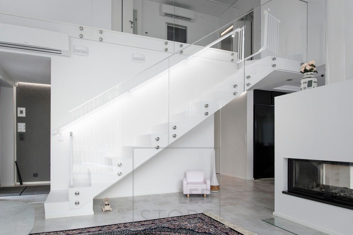 Balustrade lighting creates mood lighting on staircases and highlights a beautiful staircase.